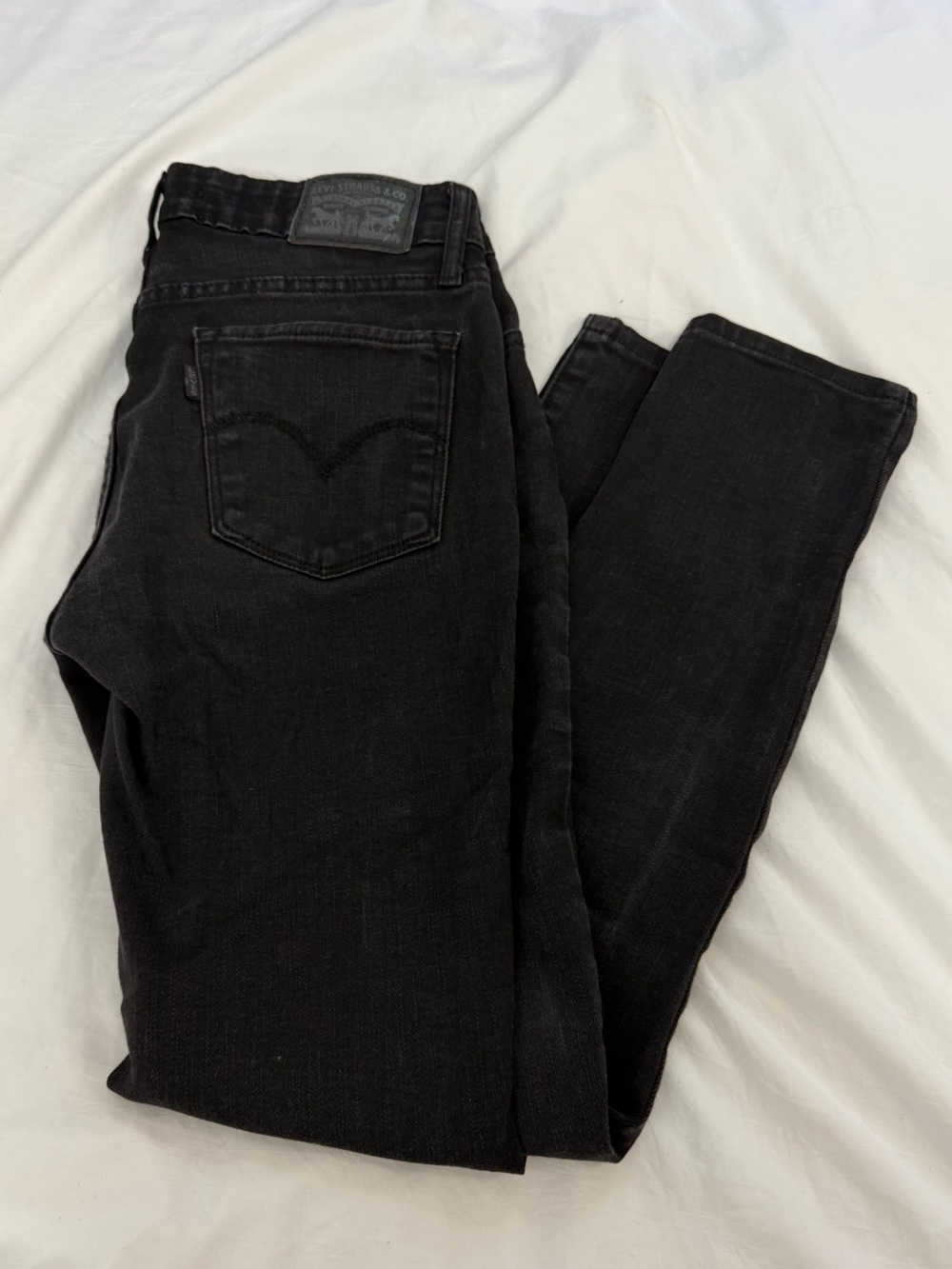 Levi’s Women’s 711 Skinny Black washed out Jeans